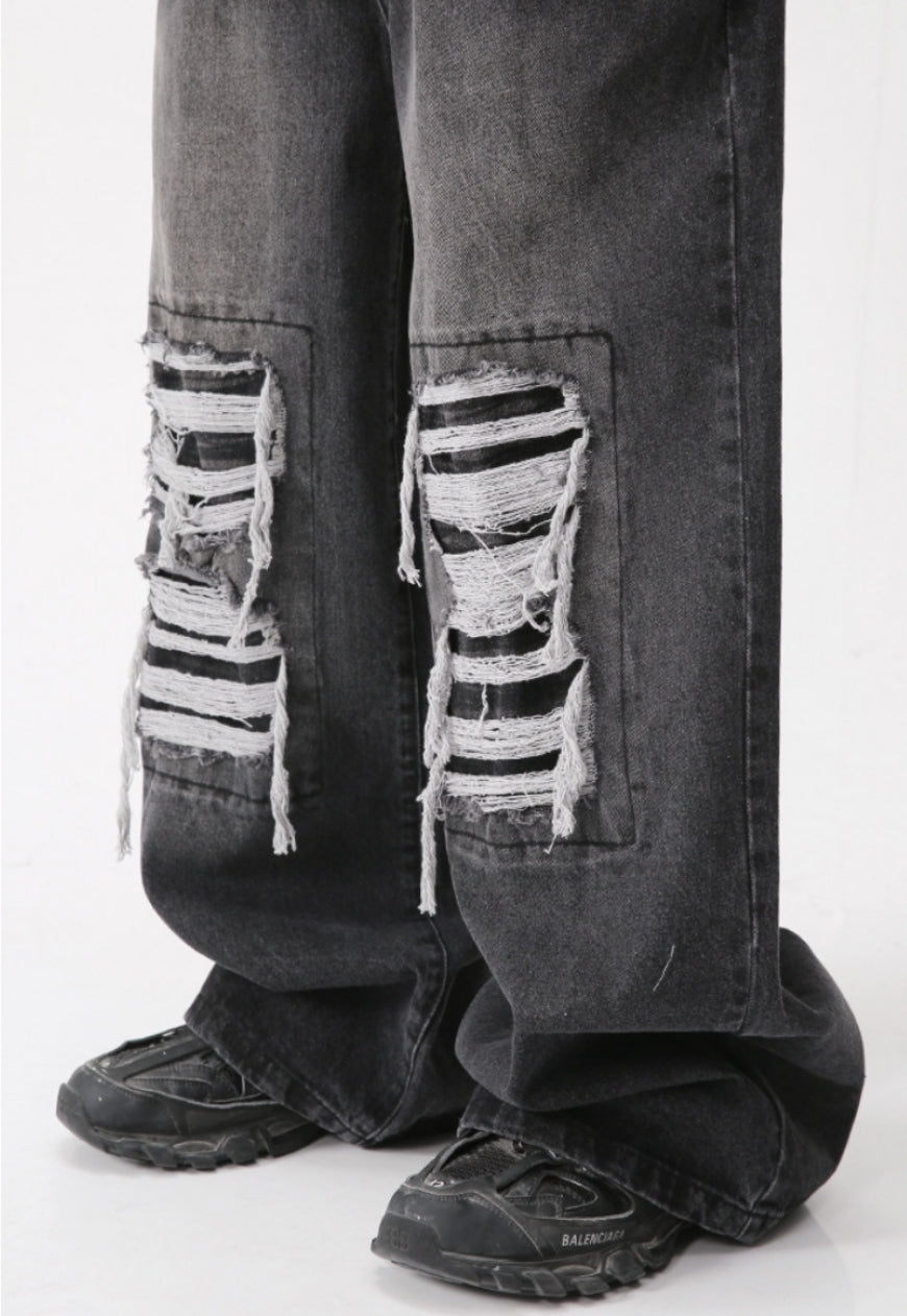 Unisex ripped denim trousers