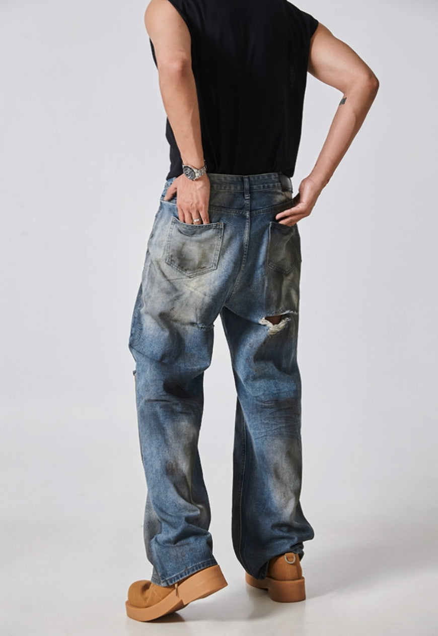 Men's ripped distressed jeans
