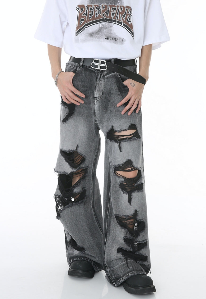 Unisex ripped floor mopping jeans