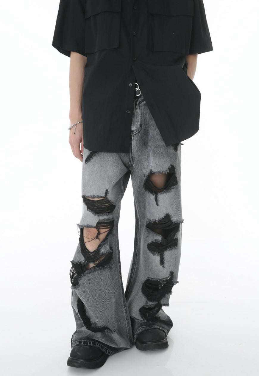 Unisex ripped floor mopping jeans